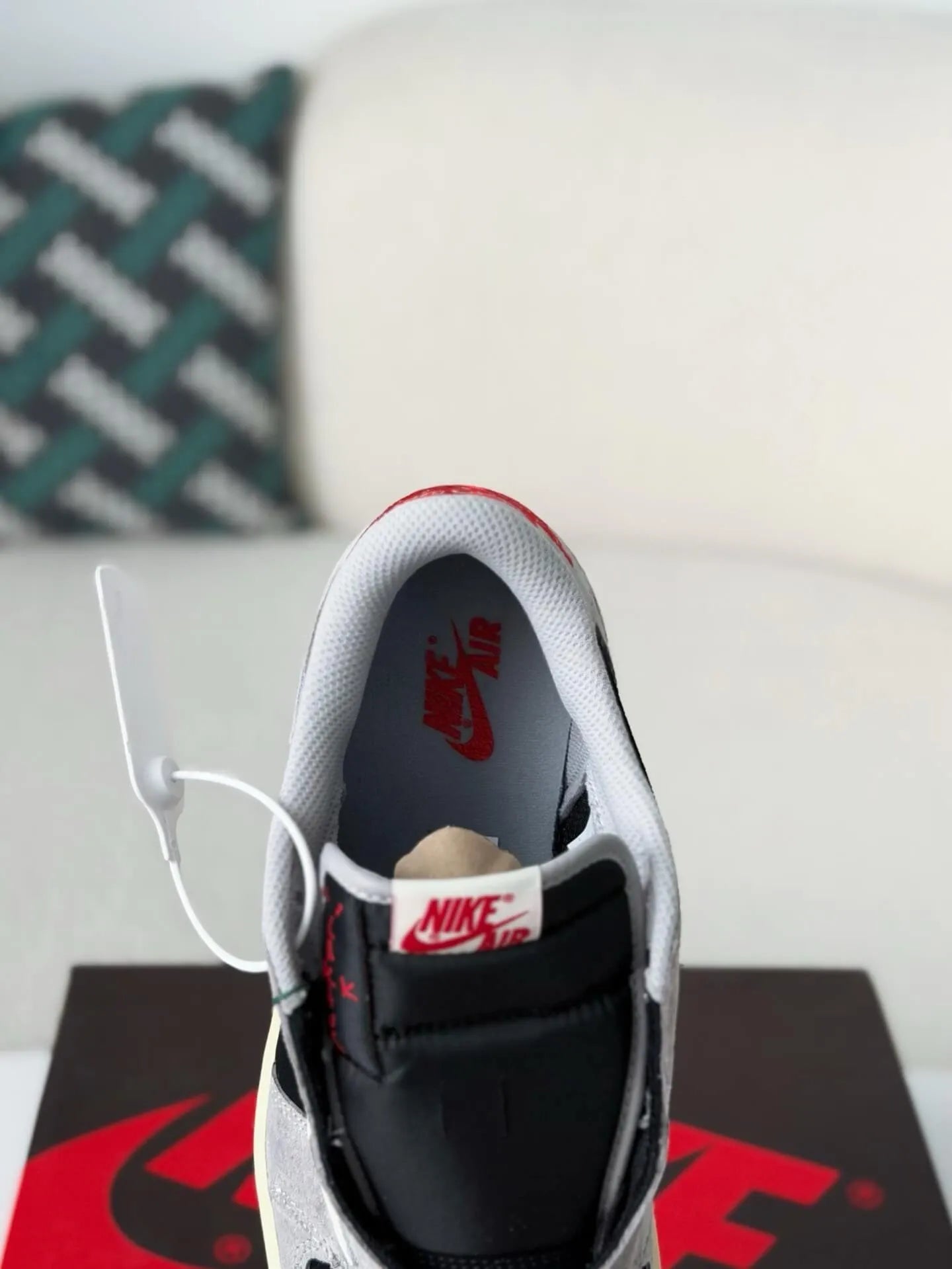 Travis Scott x Air Jordan 1 Low “Black Grey Reverse Swoosh” - A Streetwear Must-Have