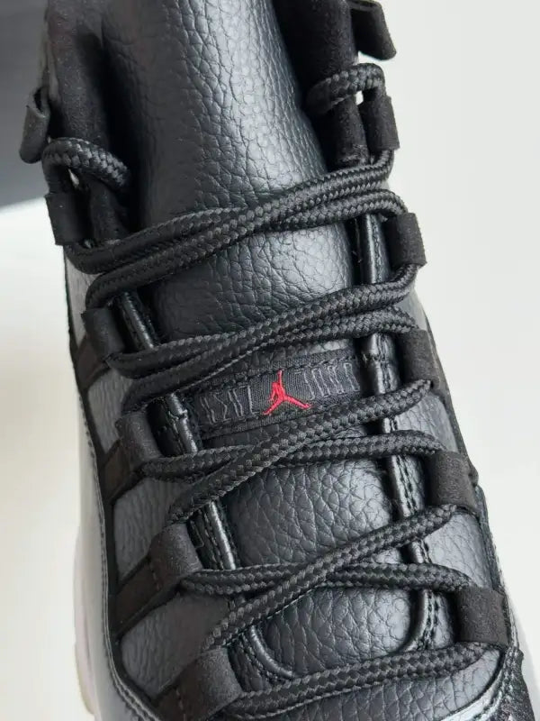 Air Jordan 11 Bred – Iconic Black, Red & White Sneakers