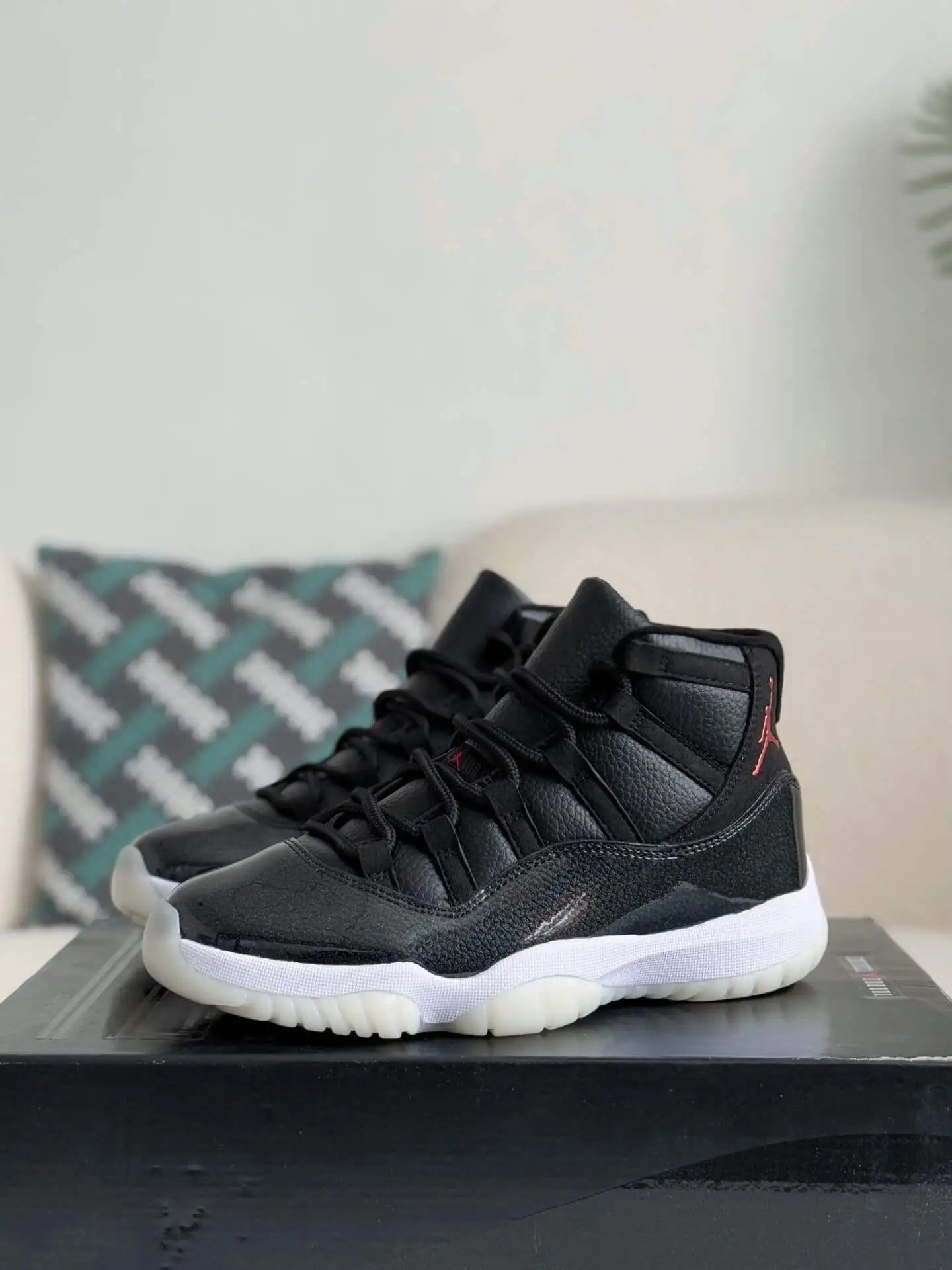 Air Jordan 11 Bred – Iconic Black, Red & White Sneakers