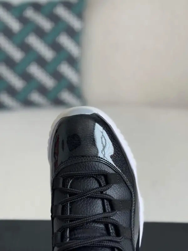 Air Jordan 11 Bred – Iconic Black, Red & White Sneakers