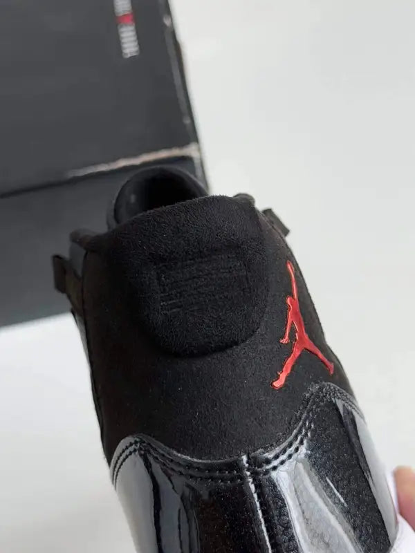 Air Jordan 11 Bred – Iconic Black, Red & White Sneakers