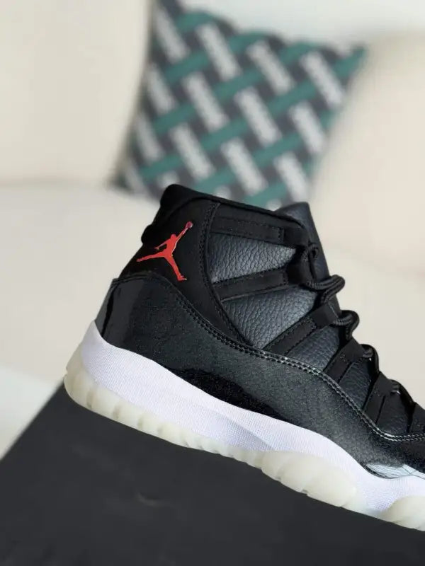 Air Jordan 11 Bred – Iconic Black, Red & White Sneakers
