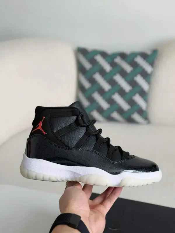 Air Jordan 11 Bred – Iconic Black, Red & White Sneakers