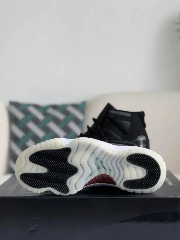 Air Jordan 11 Bred – Iconic Black, Red & White Sneakers