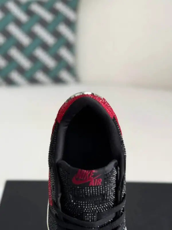 Air Jordan 1 Low – Bred Bling Black & Red: Shine in Style