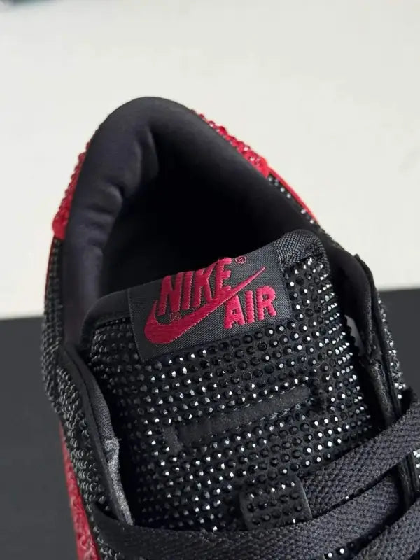 Air Jordan 1 Low – Bred Bling Black & Red: Shine in Style
