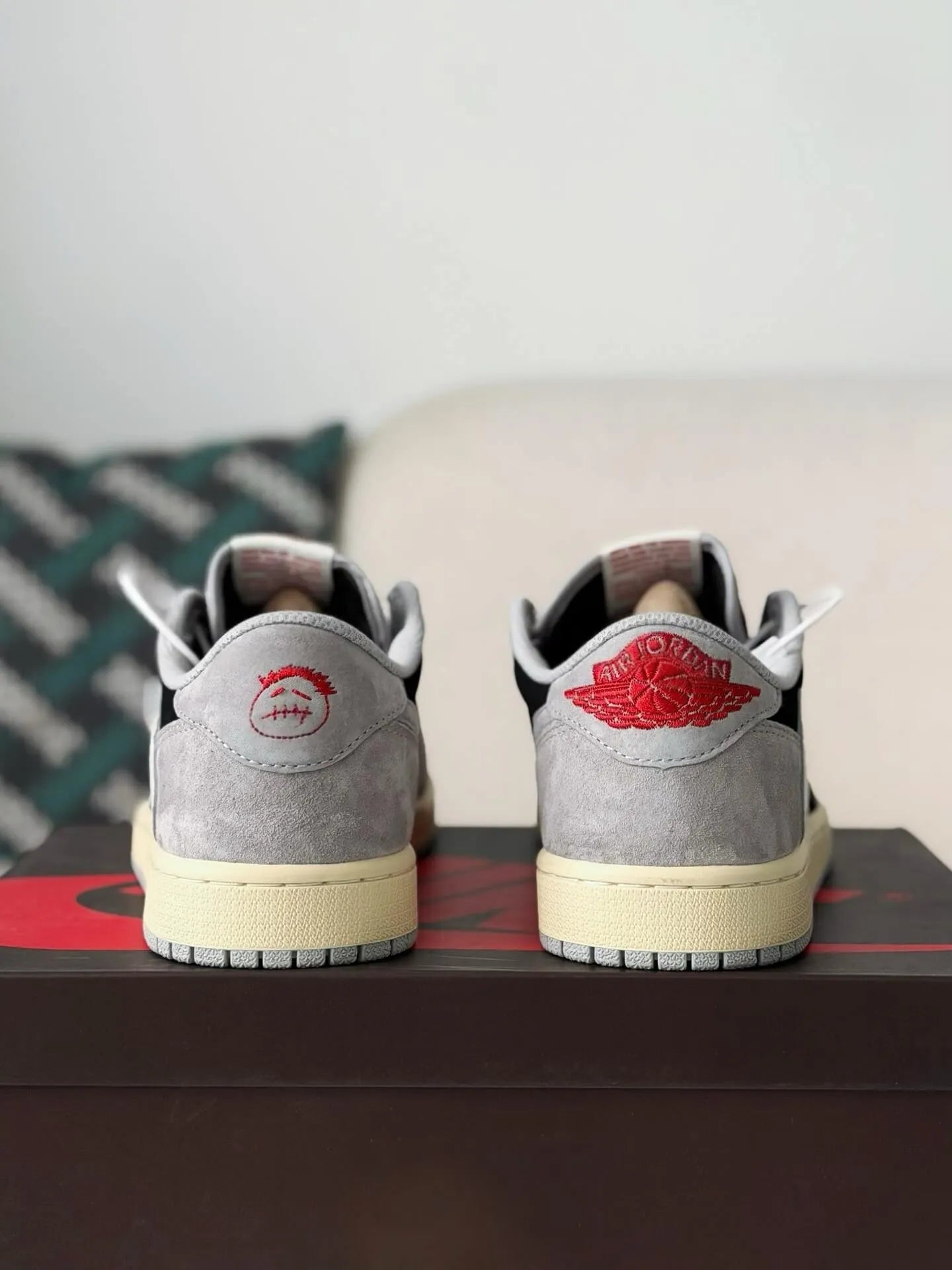 Travis Scott x Air Jordan 1 Low “Black Grey Reverse Swoosh” - A Streetwear Must-Have