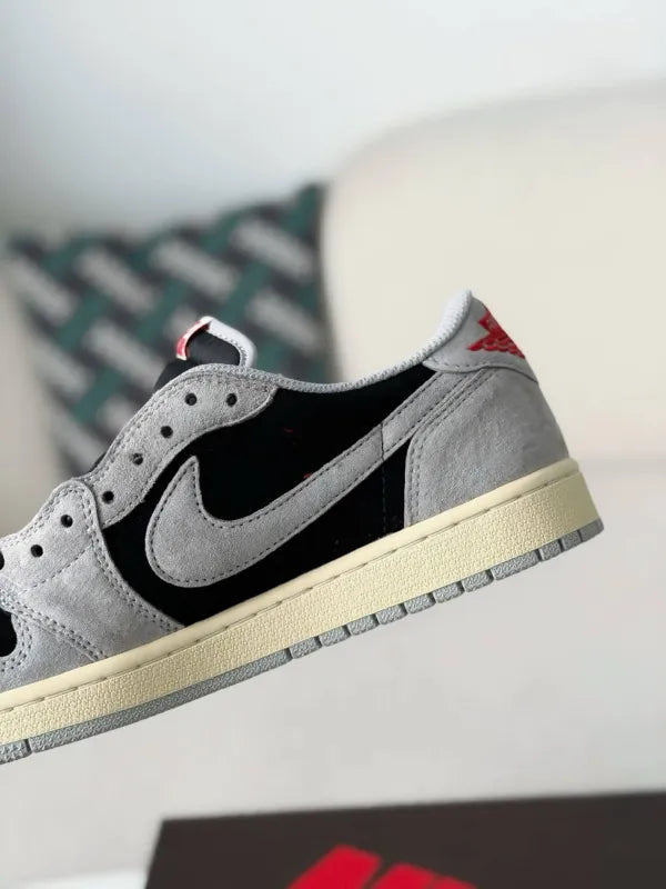 Travis Scott x Air Jordan 1 Low “Black Grey Reverse Swoosh” - A Streetwear Must-Have