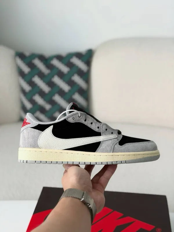 Travis Scott x Air Jordan 1 Low “Black Grey Reverse Swoosh” - A Streetwear Must-Have