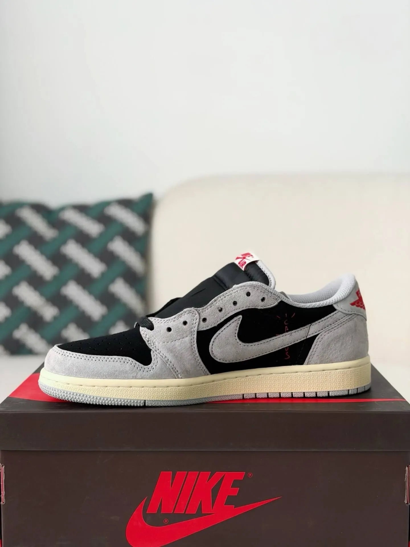 Travis Scott x Air Jordan 1 Low “Black Grey Reverse Swoosh” - A Streetwear Must-Have