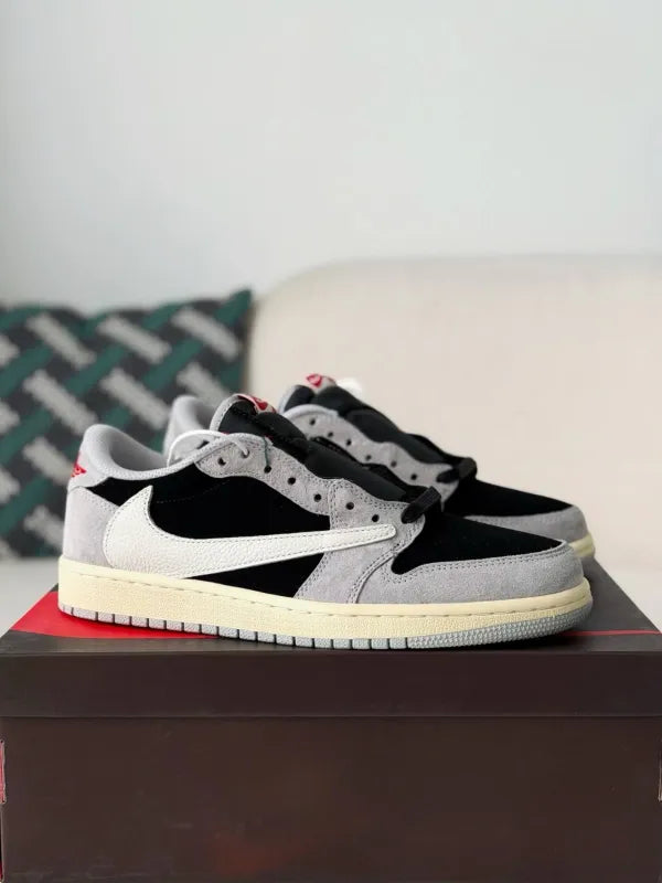 Travis Scott x Air Jordan 1 Low “Black Grey Reverse Swoosh” - A Streetwear Must-Have