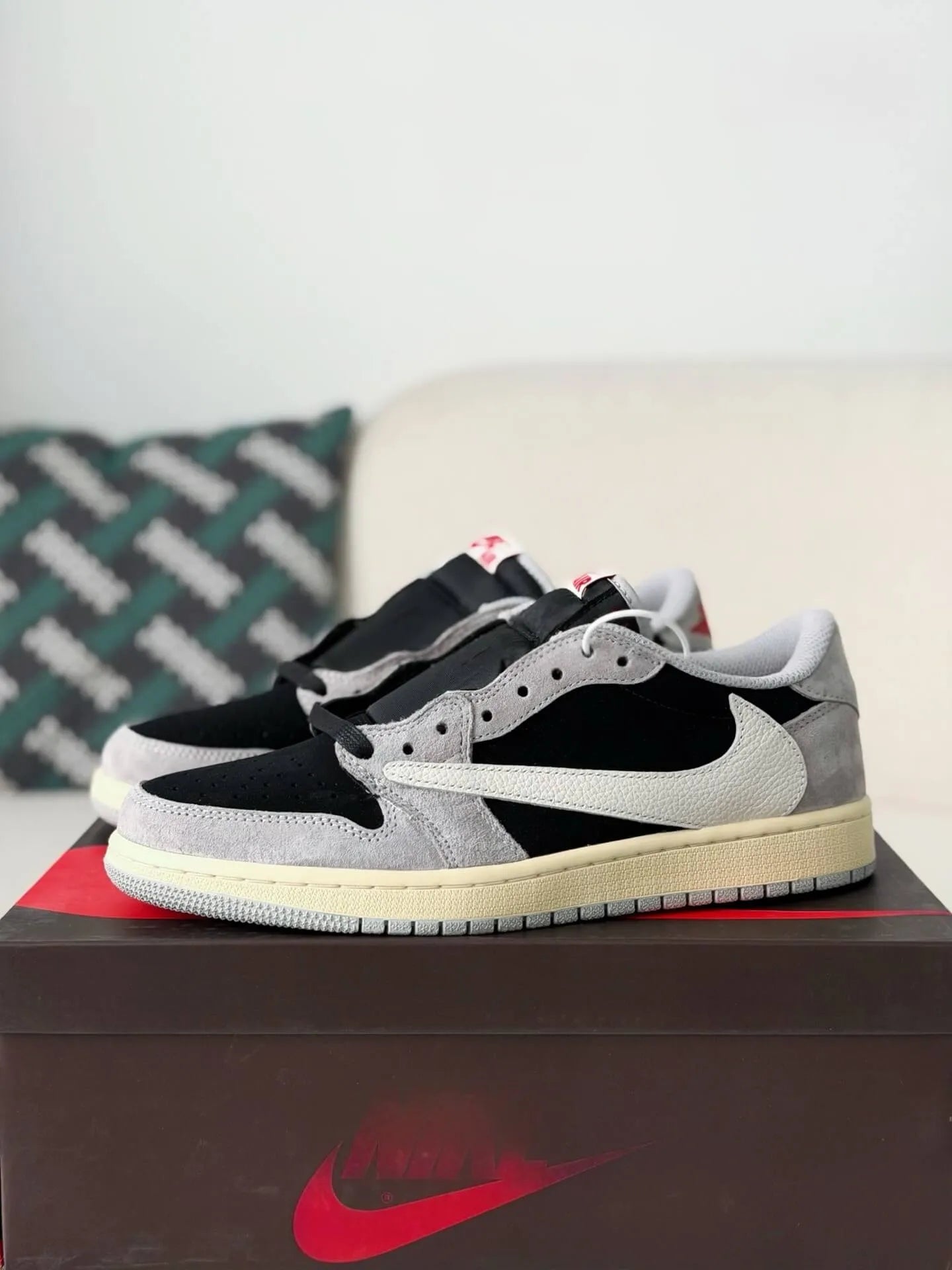 Travis Scott x Air Jordan 1 Low “Black Grey Reverse Swoosh” - A Streetwear Must-Have