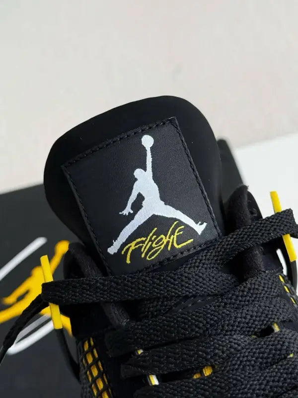 Air Jordan 4 Retro Thunder - Black & Yellow