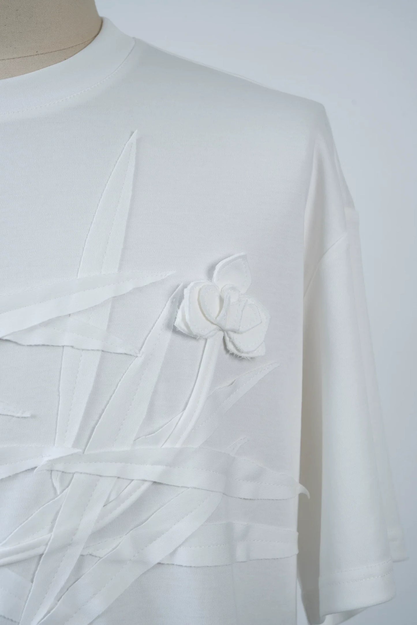 Ivory Crossed Bloom Relief Tee