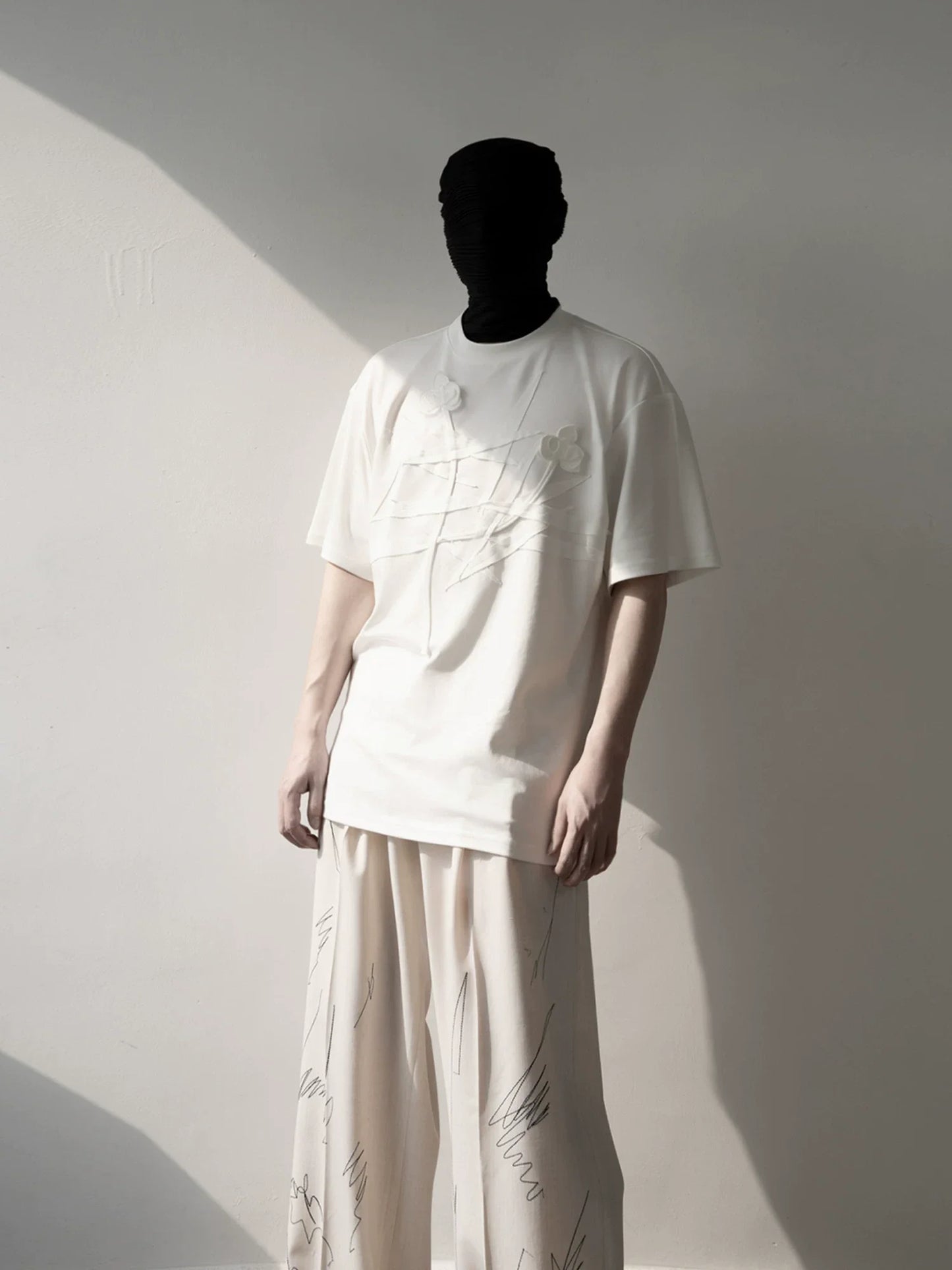 Ivory Crossed Bloom Relief Tee
