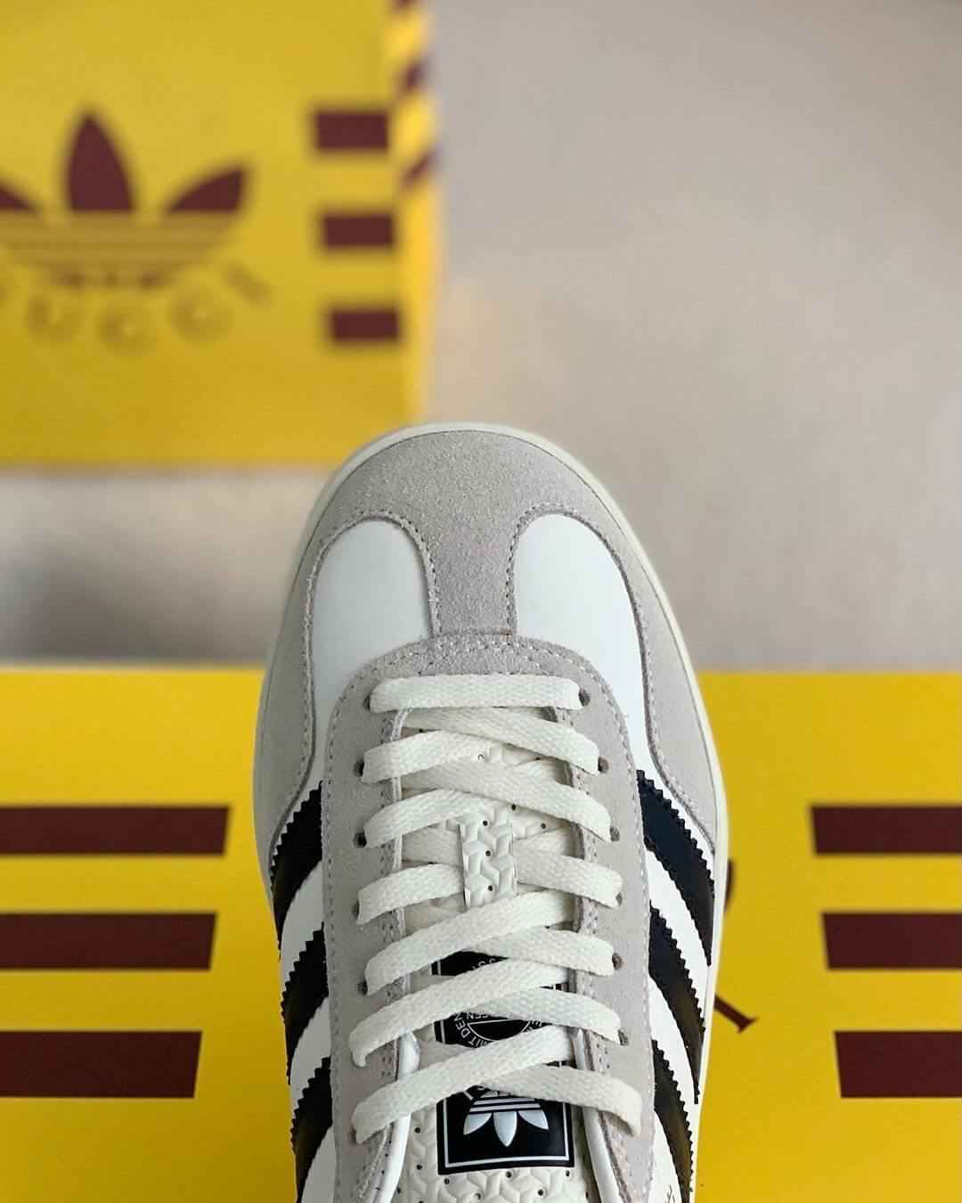 Adidas x Gucci Gazelle Sneaker in White with Black Stripes and Red Heel Tab