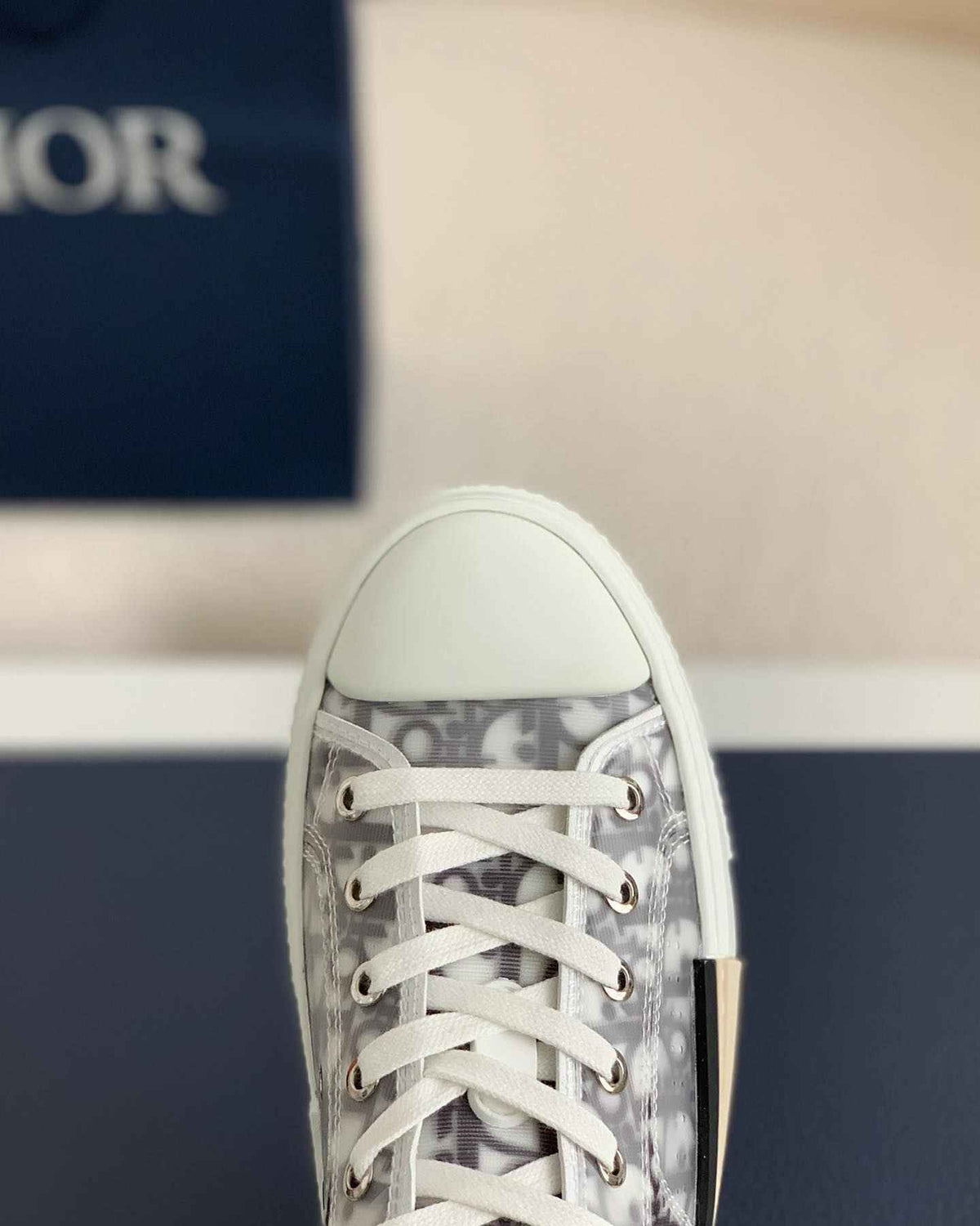 Dior B23 Low-Top Sneaker in White Dior Oblique Transparent Canvas with Gold-Tone Midsole Detail